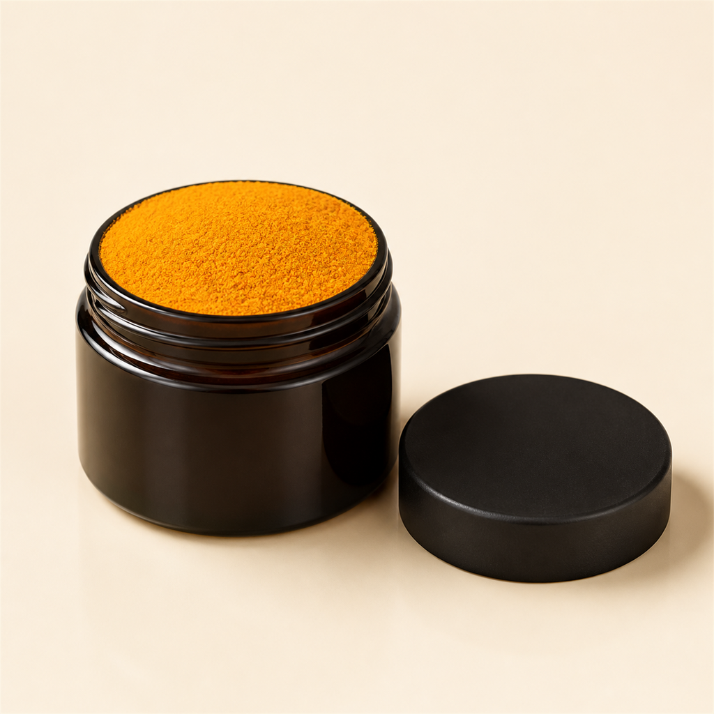 Golden Air 7OH powder - open dark glass jar of fine orange-yellow powder with matte black lid